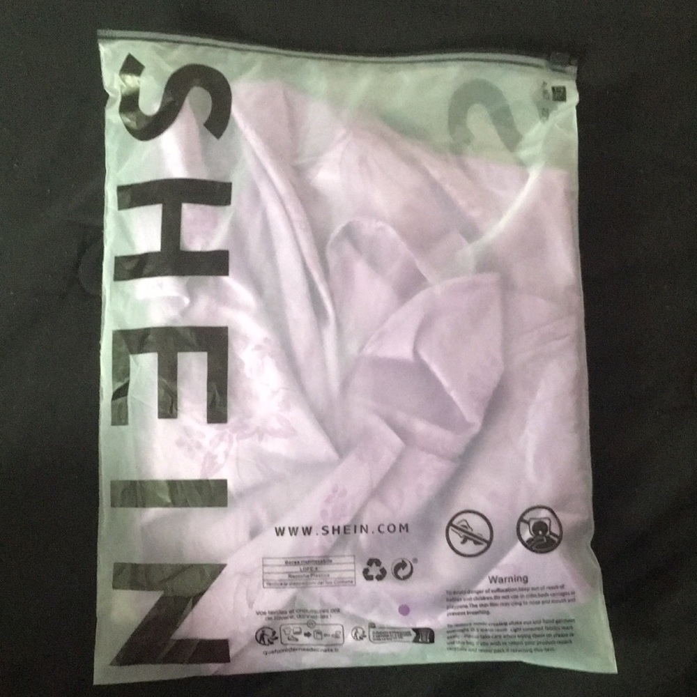 Purple dress with flower details low front and low back